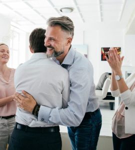 People celebrating in an office