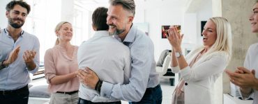 People celebrating in an office