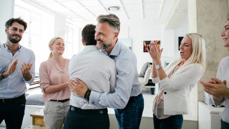 People celebrating in an office