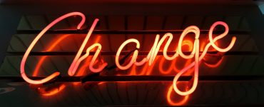 Neon sign that says Change