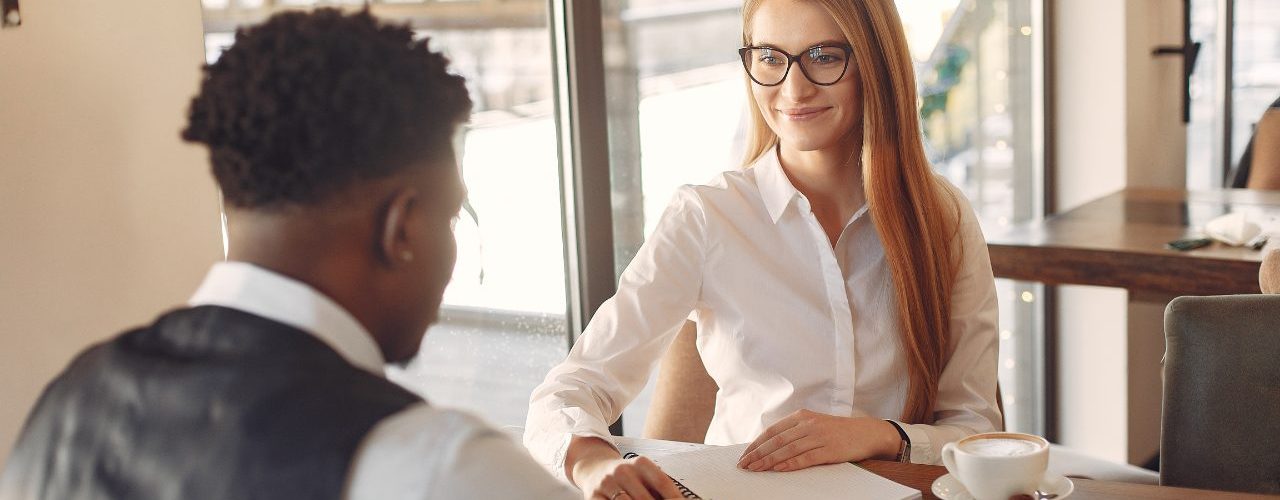 Job applicant being asked behavioral interview questions by an interviewer